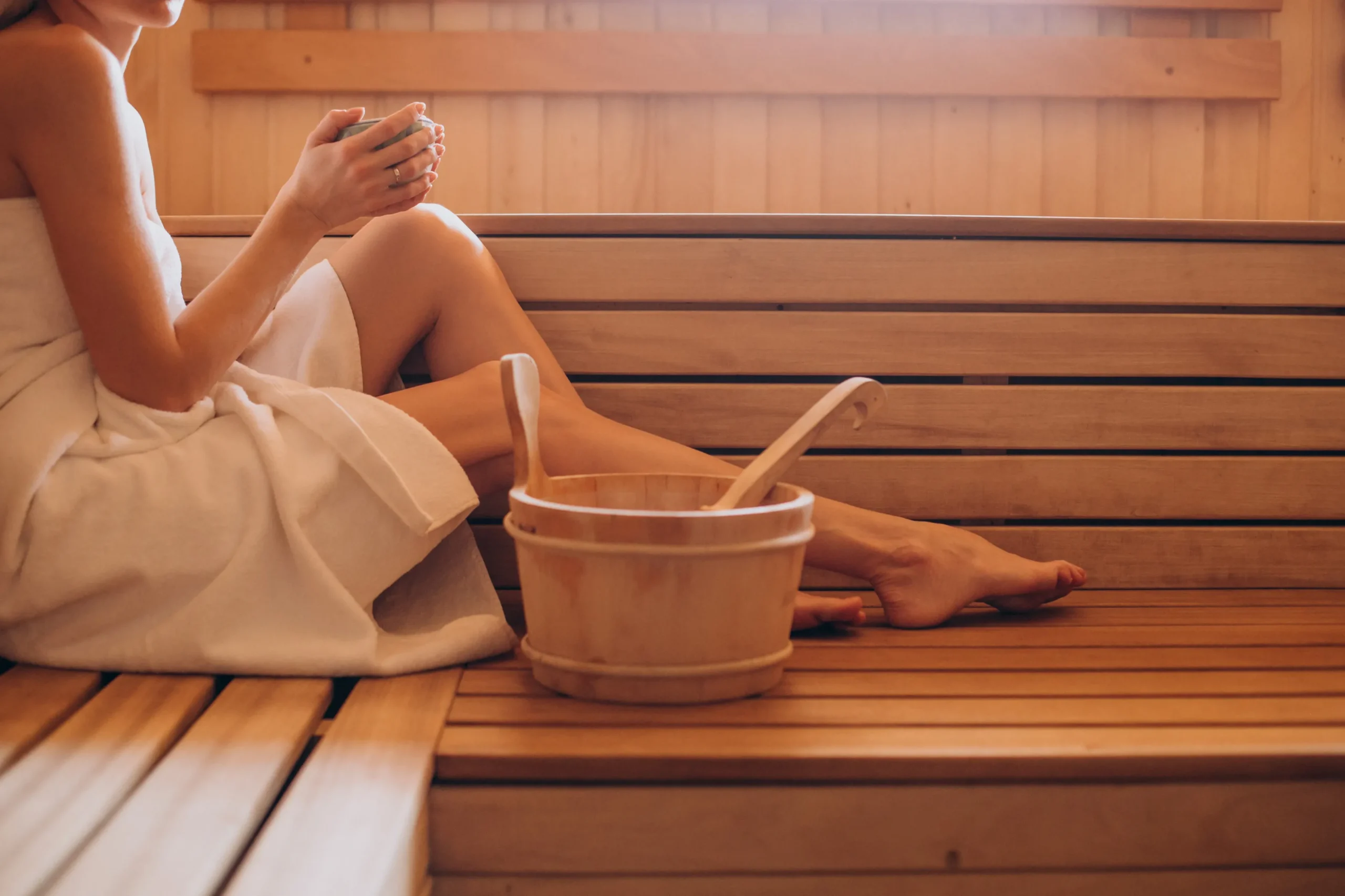 Guest relaxing in the sauna at The Spa Hotel, a luxury spa in Tunbridge Wells, Kent.