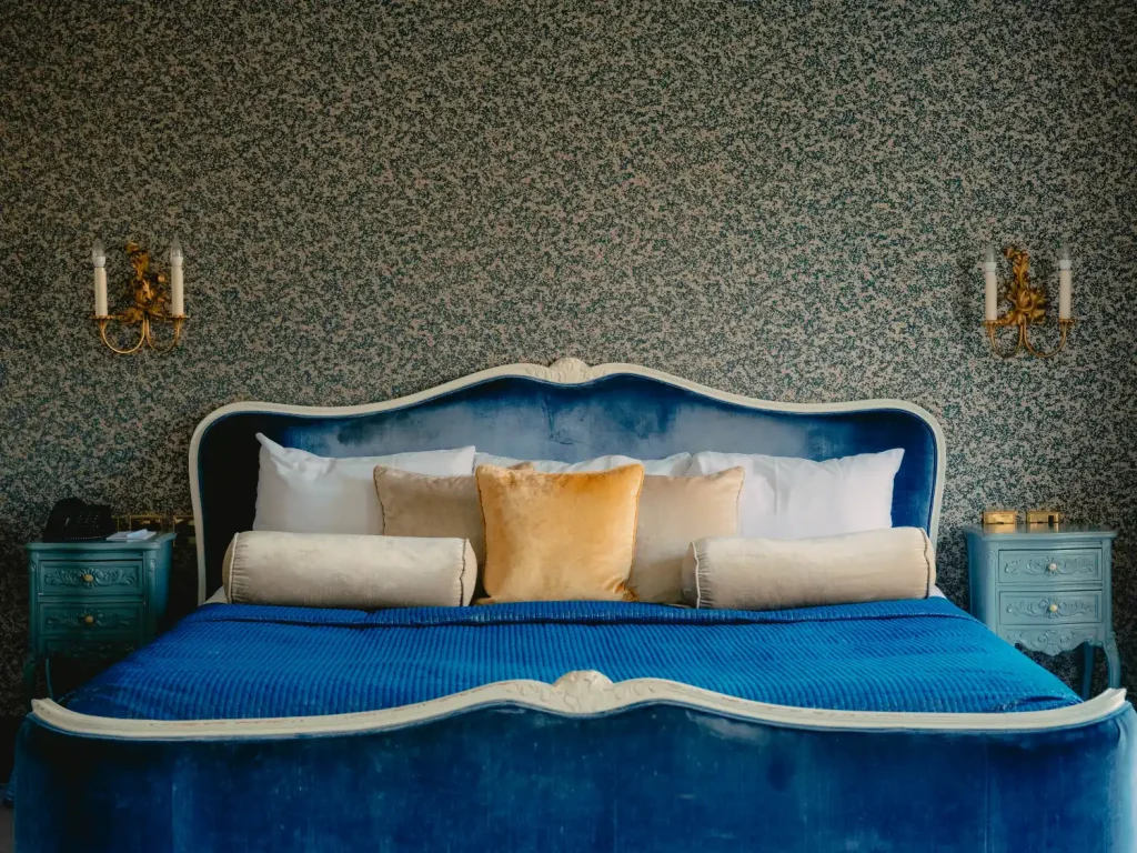 A beautiful made bed in a luxury room at The Spa Hotel in Tunbridge Wells